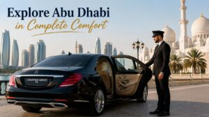 Luxury chauffeur service in Abu Dhabi with a Mercedes-Benz S-Class near Sheikh Zayed Grand Mosque.